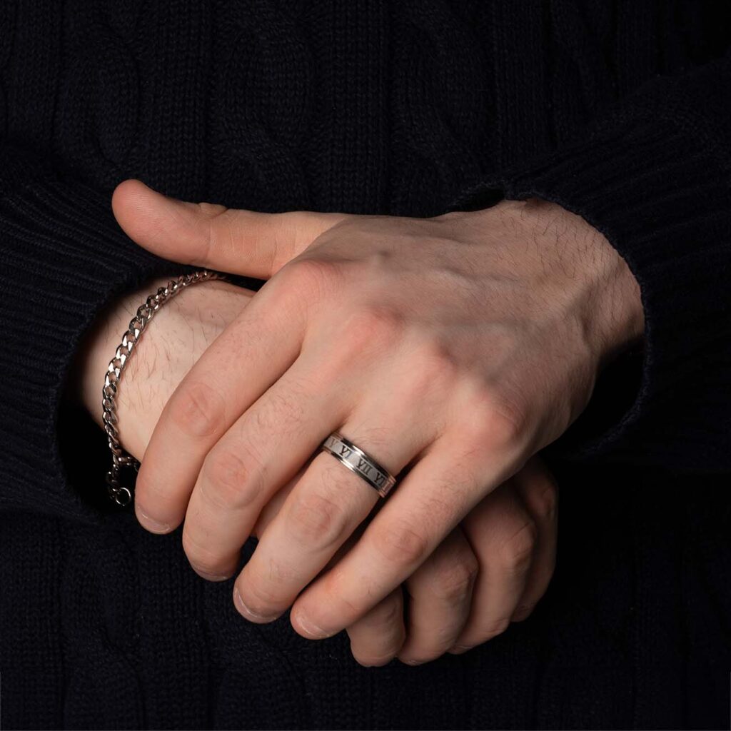 Male Model Showcases Roman Ring as an Elegant Fashion Accessory on Hand